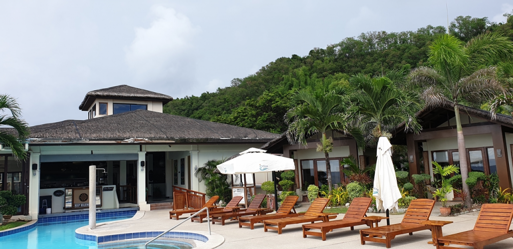 Pool and view of the club house and restaurant in Kahuna Beach Resort in San Juan La Union