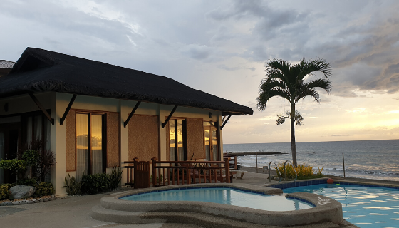 Ocean View Suite with pool overlooking the beach during sunset at Kahuna Resort in San Juan La Union Philippines